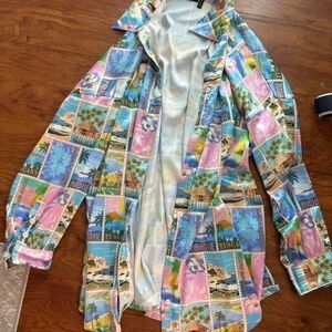 Multicoloured silk button-up shirt with a tropical print #tropical #silk